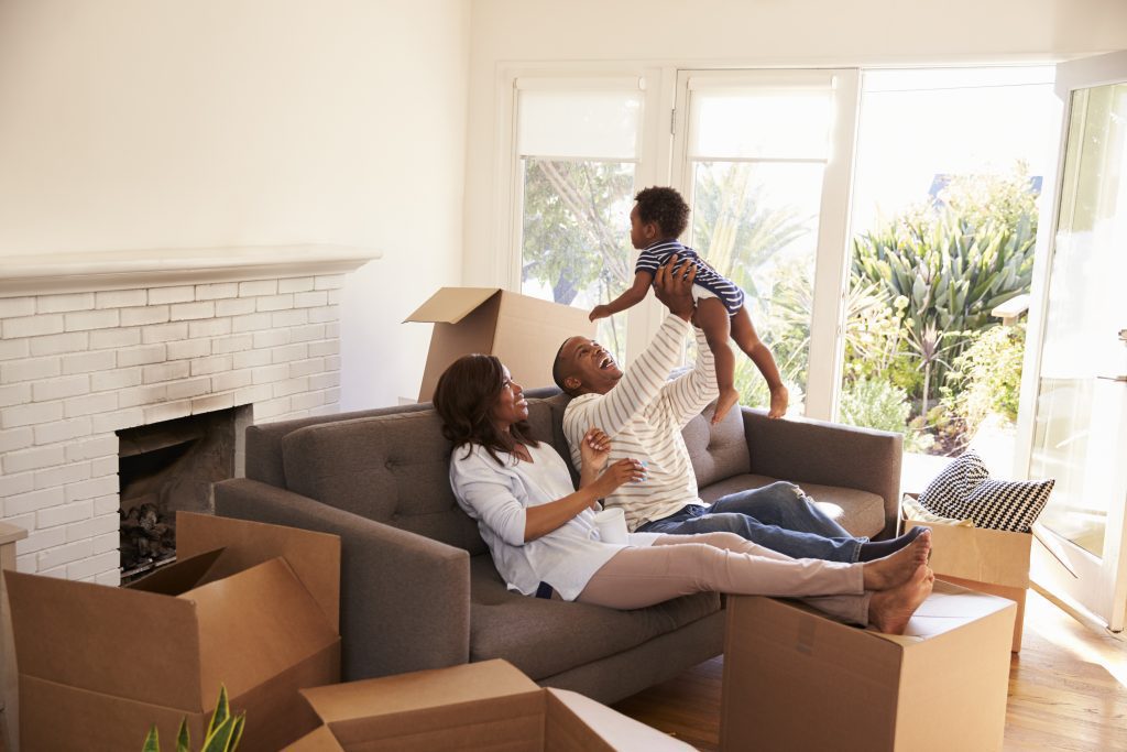 Family playing games in living room