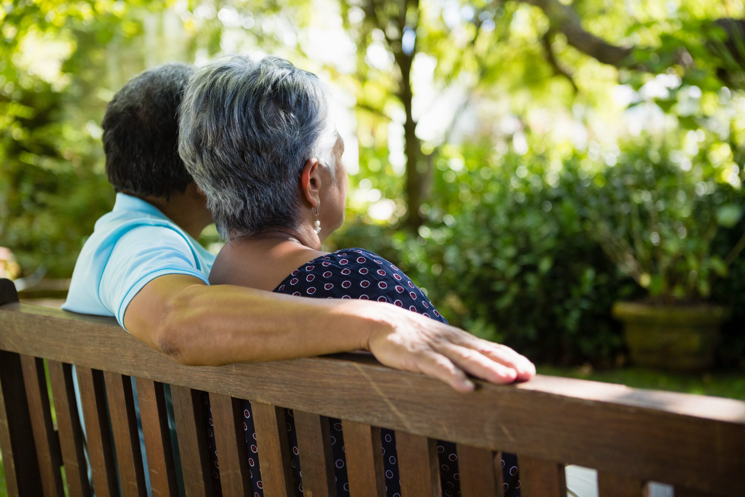 Older couple sitting on a bench